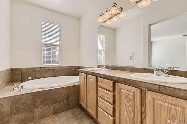 3491 Cascina Pl Unit D, Highlands Ranch, CO 80126 - bathroom featuring double vanity, a garden tub, and tile patterned flooring