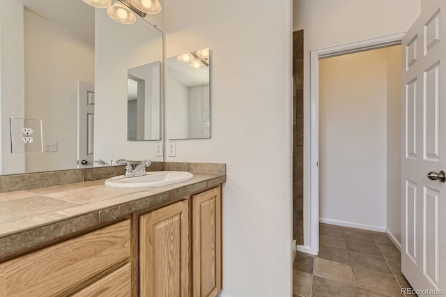 3491 Cascina Pl Unit D, Highlands Ranch, CO 80126 - bathroom featuring vanity and baseboards
