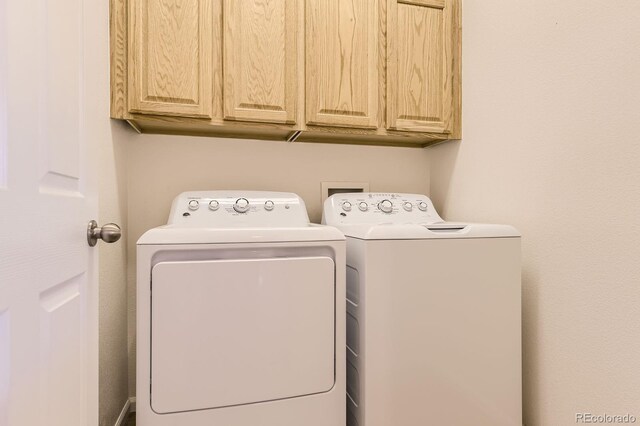 3491 Cascina Pl Unit D, Highlands Ranch, CO 80126 - laundry room with washing machine and dryer and cabinet space
