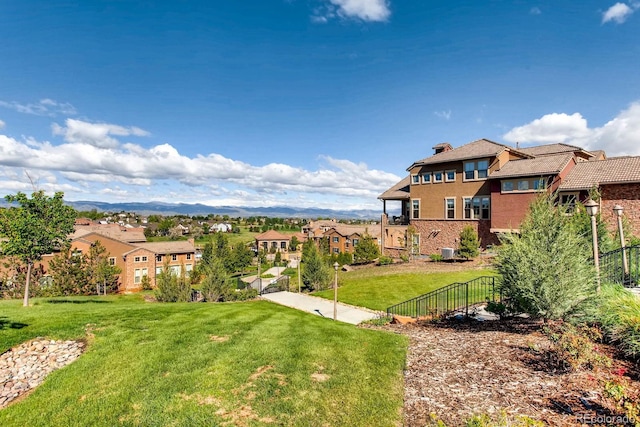 3491 Cascina Pl Unit D, Highlands Ranch, CO 80126 - view of green lawn featuring a residential view