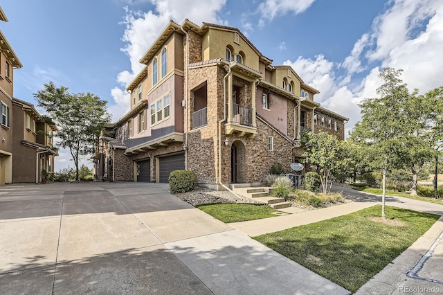 3491 Cascina Pl Unit D, Highlands Ranch, CO 80126 - view of property featuring an attached garage and driveway