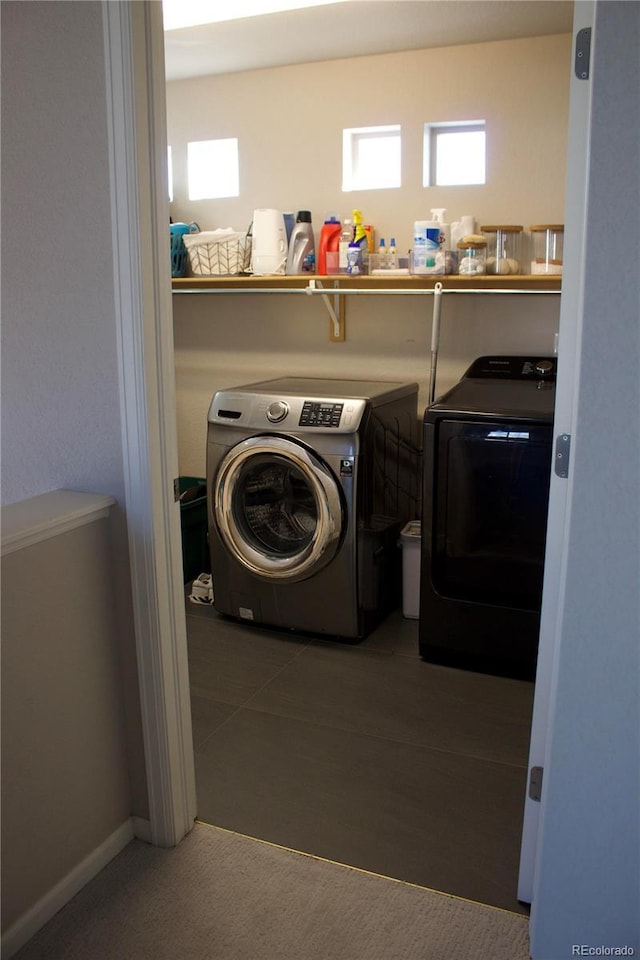 laundry room featuring washer and clothes dryer