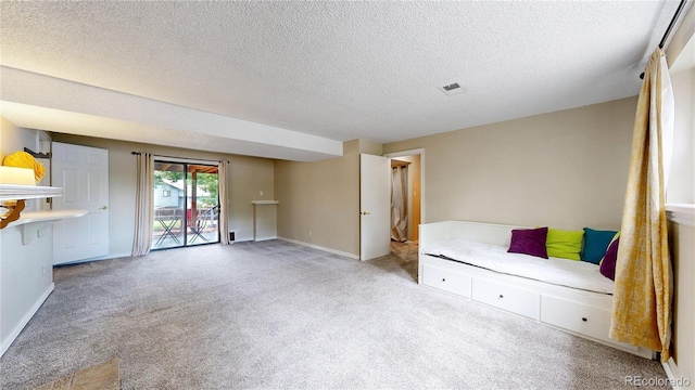 10718 Ash Ct, Thornton, CO 80233 - unfurnished living room with carpet flooring and a textured ceiling