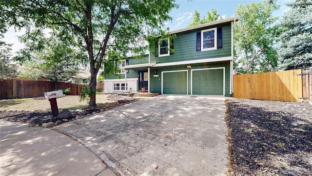 10718 Ash Ct, Thornton, CO 80233 - view of front facade with an attached garage and driveway