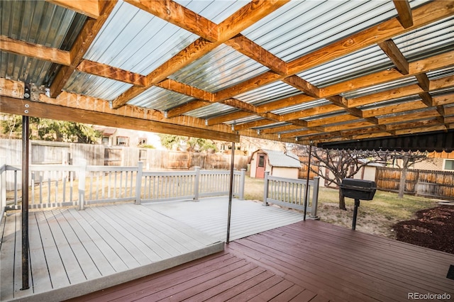 1409 S Moline St, Aurora, CO 80012 - deck with a fenced backyard, a storage shed, and grilling area