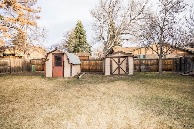1409 S Moline St, Aurora, CO 80012 - fenced backyard featuring a shed