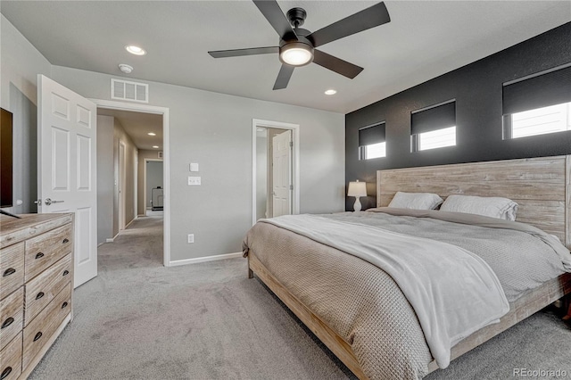 carpeted bedroom featuring ceiling fan