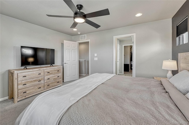 carpeted bedroom with ceiling fan