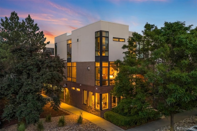 3220 Zuni St, Denver, CO 80211 - view of front of property featuring a balcony and stucco siding