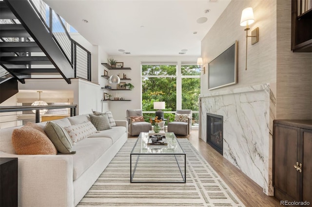 3220 Zuni St, Denver, CO 80211 - living area with wood finished floors, a fireplace, and stairway