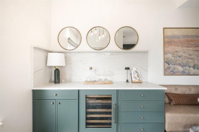 3220 Zuni St, Denver, CO 80211 - indoor dry bar featuring wine cooler and backsplash