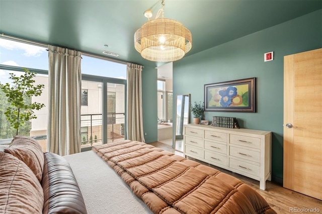 3220 Zuni St, Denver, CO 80211 - bedroom featuring light wood-style flooring and multiple windows