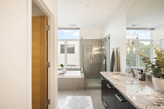 3220 Zuni St, Denver, CO 80211 - full bath featuring vanity, healthy amount of natural light, a bath, a shower stall, and floor to ceiling windows