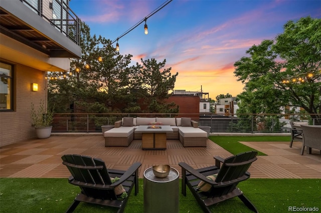 3220 Zuni St, Denver, CO 80211 - patio terrace at dusk with an outdoor living space with a fire pit, a balcony, and a patio area