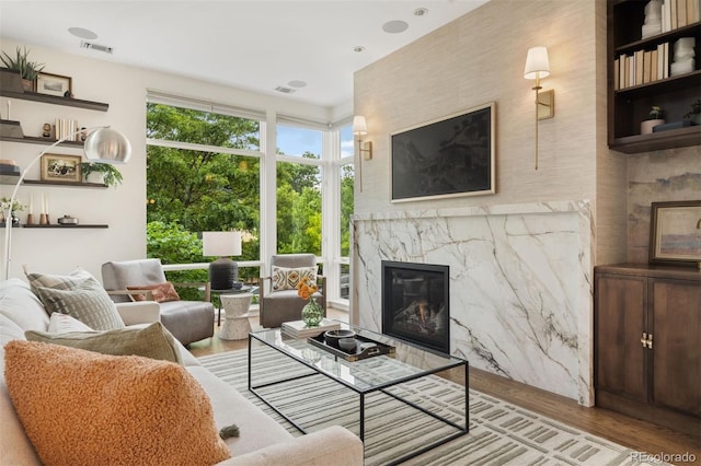 3220 Zuni St, Denver, CO 80211 - living area with a high end fireplace and wood finished floors