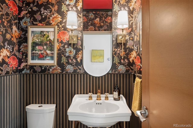 3220 Zuni St, Denver, CO 80211 - bathroom featuring wallpapered walls and a sink