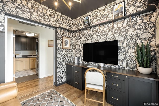 3220 Zuni St, Denver, CO 80211 - home office with wallpapered walls and wood finished floors