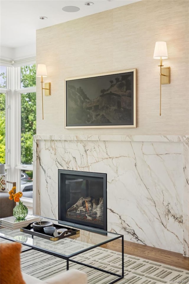 3220 Zuni St, Denver, CO 80211 - living room featuring a premium fireplace and wood finished floors