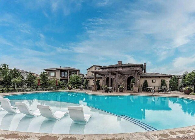 pool with a patio area