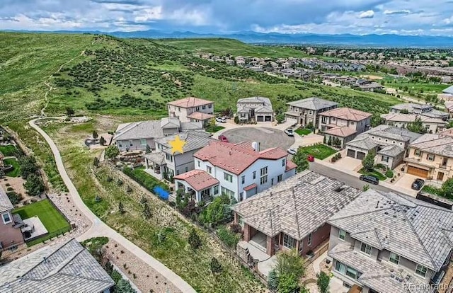 bird's eye view with a residential view and a mountain view