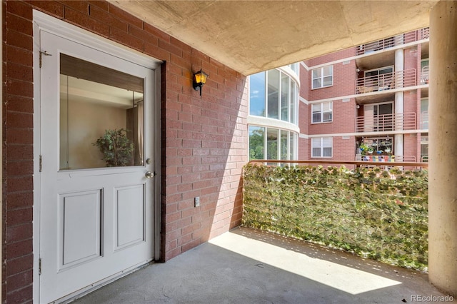 5955 E 10th Ave Unit 201, Denver, CO 80220 - view of exterior entry with brick siding