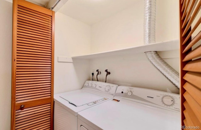 5955 E 10th Ave Unit 201, Denver, CO 80220 - washroom featuring washer and clothes dryer