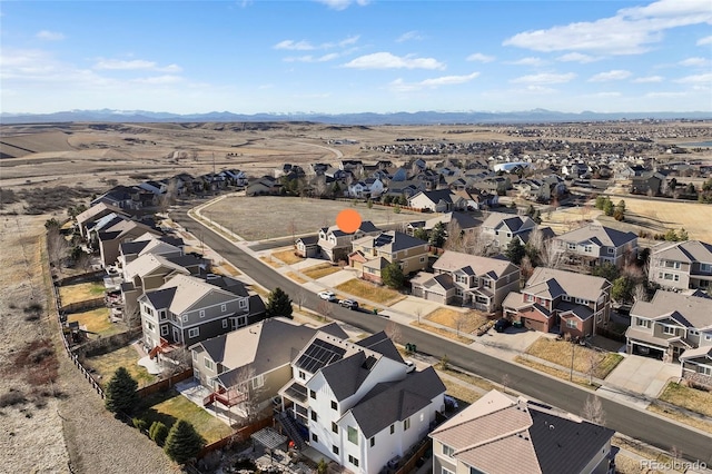 aerial view with a residential view and a mountain view