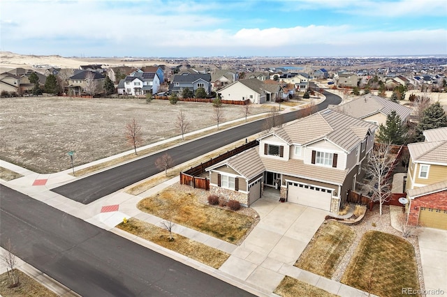 drone / aerial view with a residential view