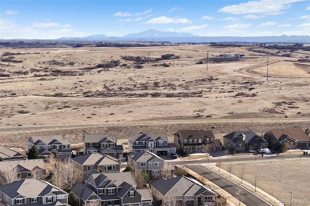 aerial view with a mountain view and a residential view