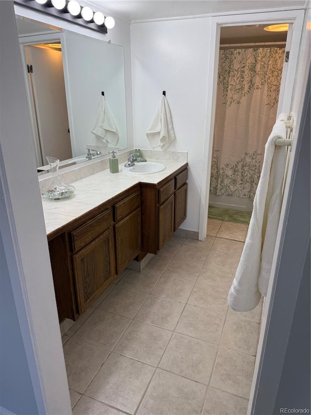 9700 E Iliff Ave Unit D44, Denver, CO 80231 - bathroom with vanity, tile patterned flooring, and a shower with curtain