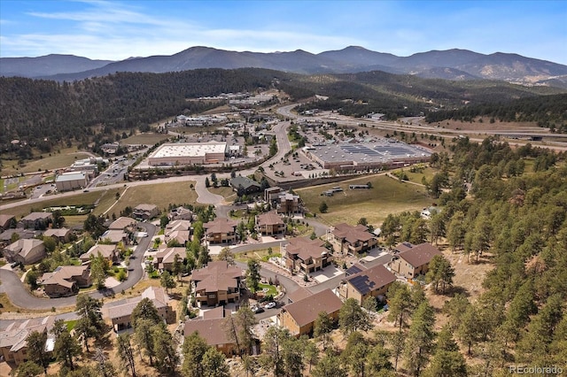 drone / aerial view featuring a mountain view