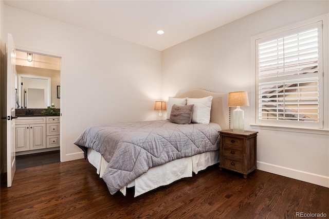 bedroom with dark wood-type flooring