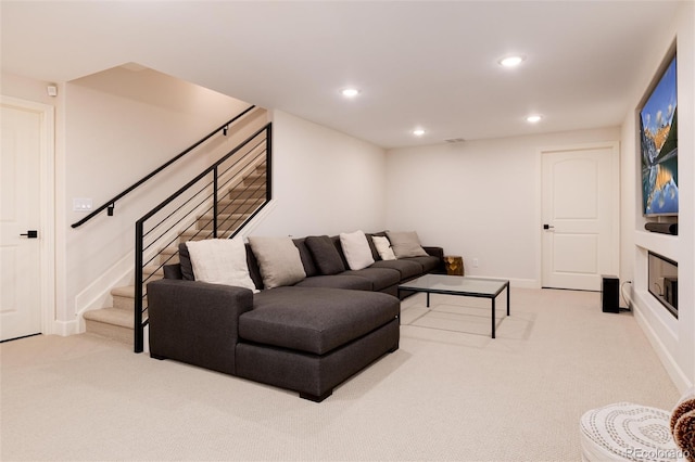 living room with light colored carpet