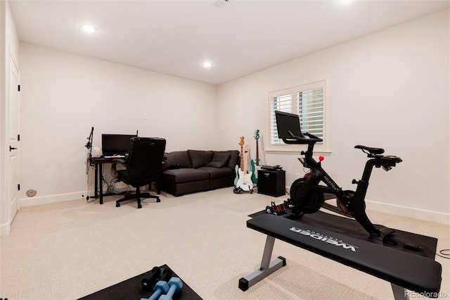 workout room featuring carpet