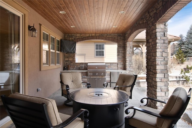 view of patio with grilling area and exterior kitchen