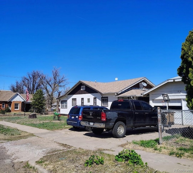 view of front of property with fence
