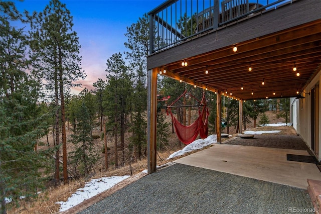 view of patio terrace at dusk