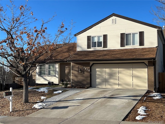 view of front of property with a garage