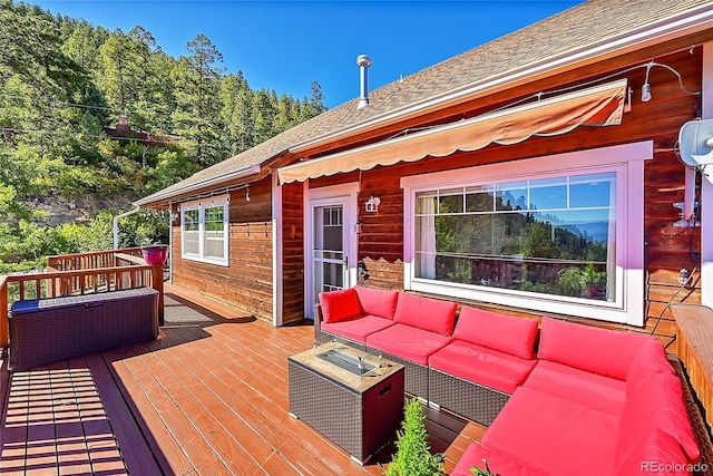 31324 Kings Vly, Conifer, CO 80433 - wooden terrace featuring an outdoor hangout area