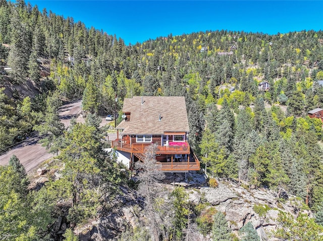 31324 Kings Vly, Conifer, CO 80433 - aerial view of property and surrounding area featuring a forest
