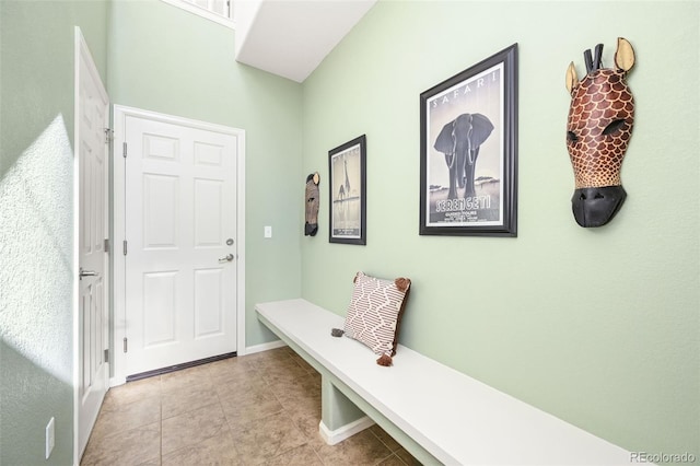 mudroom with light tile patterned floors