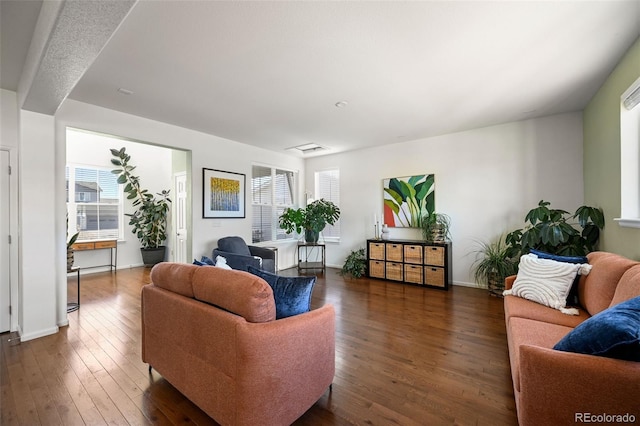 living room featuring dark hardwood / wood-style floors