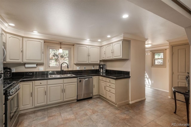 kitchen with white cabinets, crown molding, sink, and stainless steel appliances