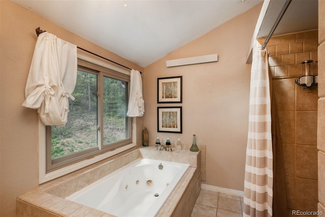 bathroom featuring tile patterned floors, lofted ceiling, and shower with separate bathtub