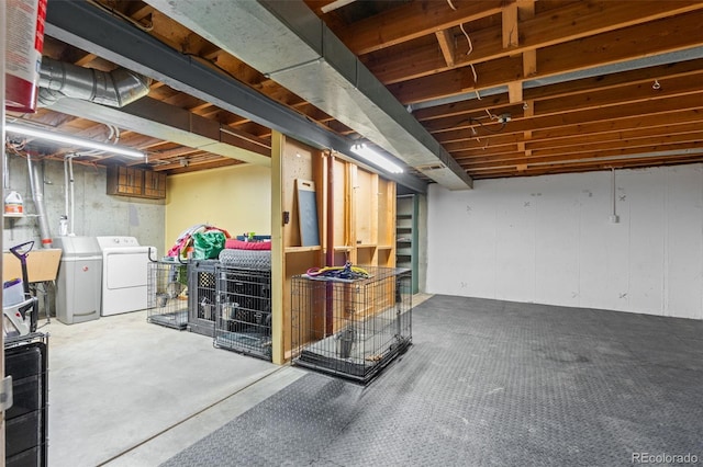 basement featuring washer and dryer