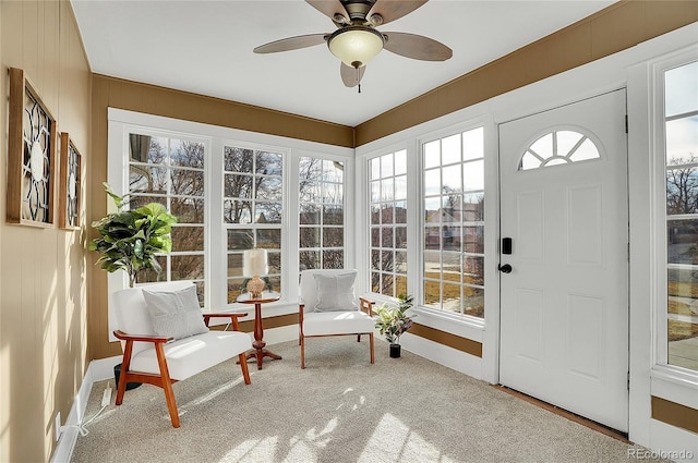 sunroom / solarium with ceiling fan