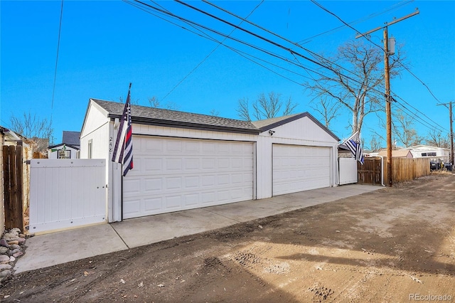 garage with fence