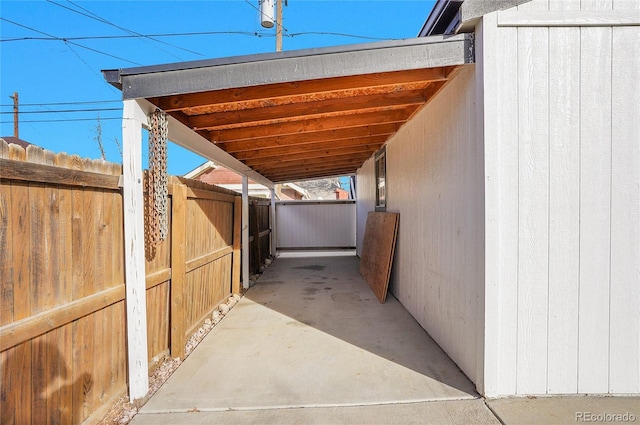 view of patio / terrace featuring a carport