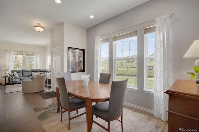 12348 W Gould Ave, Littleton, CO 80127 - dining area with light wood-style floors, recessed lighting, and baseboards
