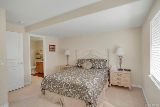 12348 W Gould Ave, Littleton, CO 80127 - bedroom featuring light colored carpet, multiple windows, and baseboards